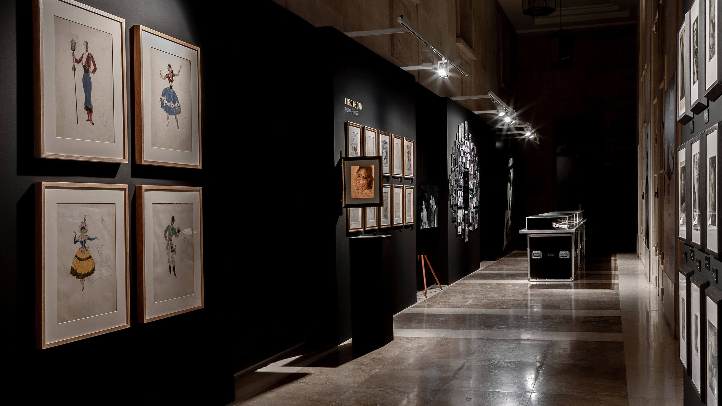 Gallery corridor — framed costume drawings by Federico Ribas